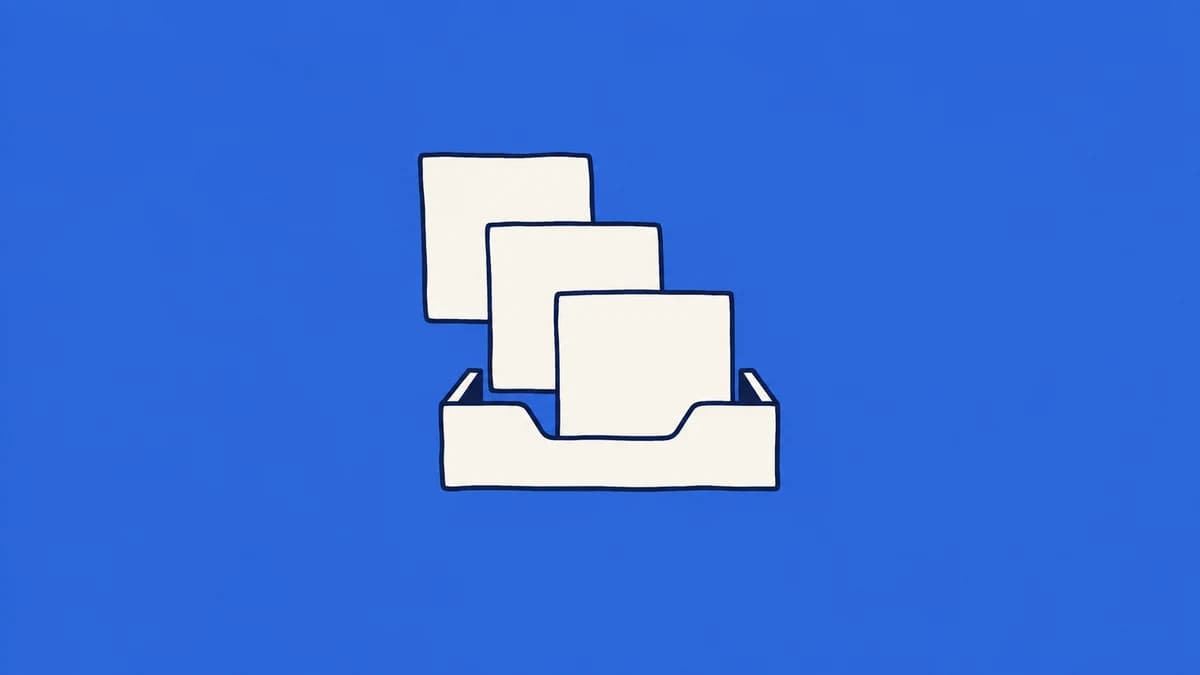 A stack of order cards moving into a tray.
